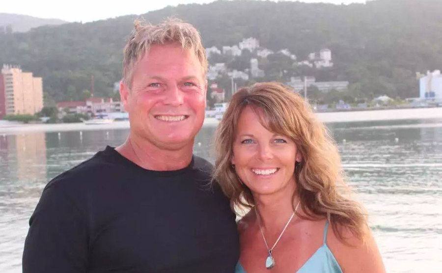 A photo of Barry and Suzanne by the beach.