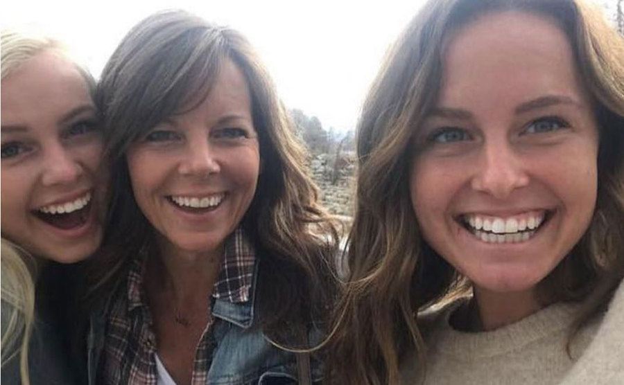 A photo of Suzanne with her daughters.