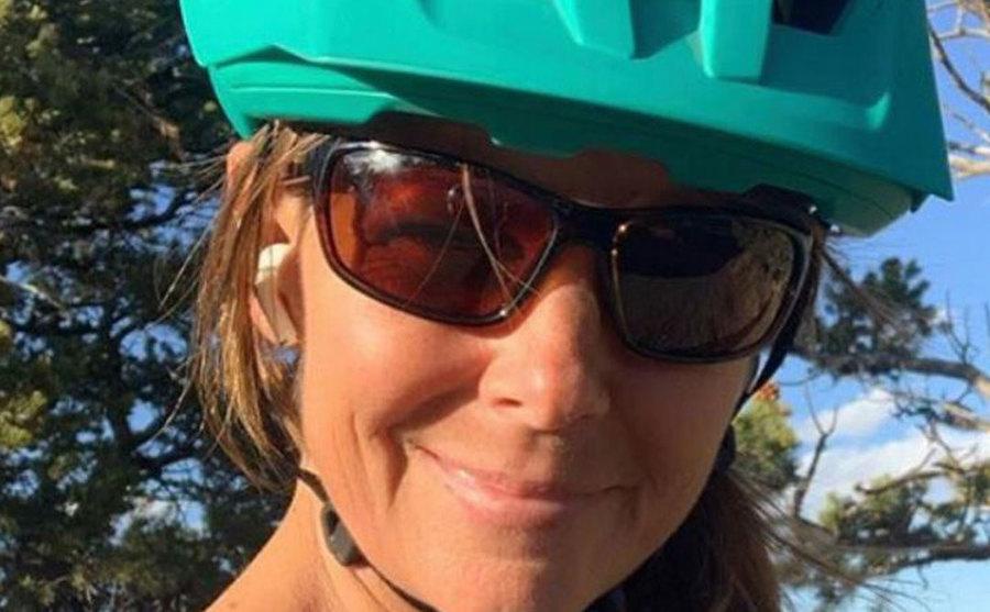 A picture of Suzanne ready to go on a bike ride.