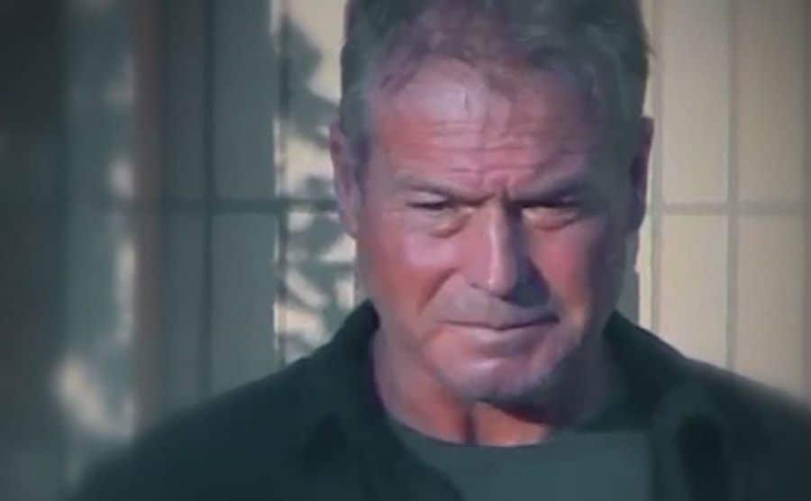 A photo of Barry outside his home.