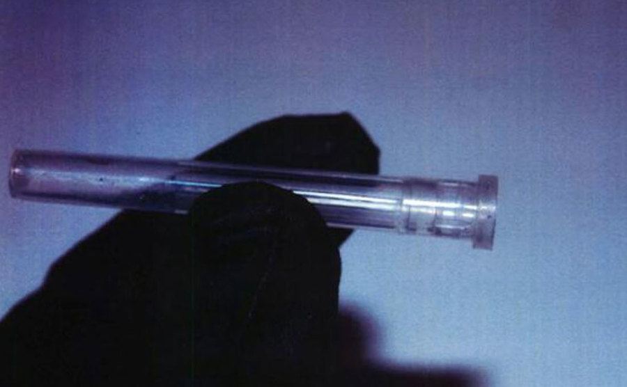 A photo of a plastic needle cap found in the dryer.