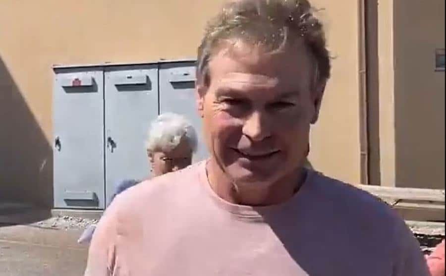 A video still of Barry arriving at court.