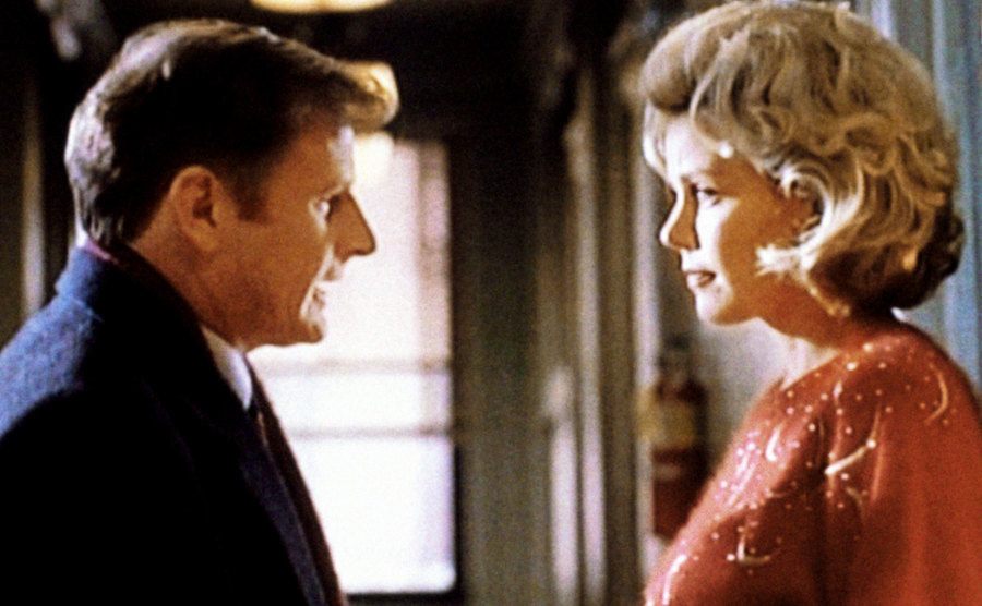 Gordon Clapp and Gail O’Grady are in a scene from the show.
