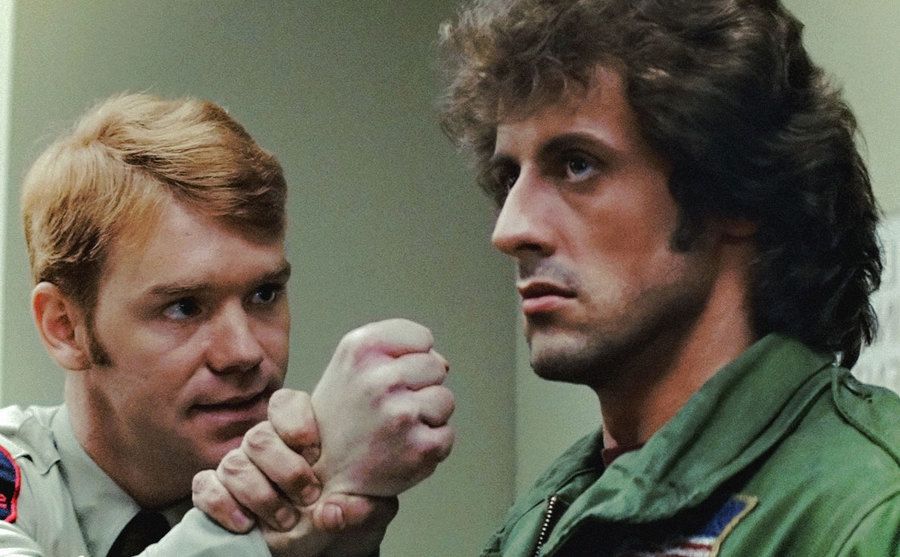 A still of David Caruso and Sylvester Stallone in First Blood.