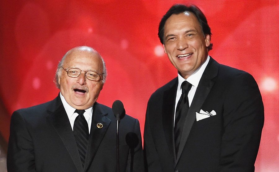 Franz and Smits speak on stage.