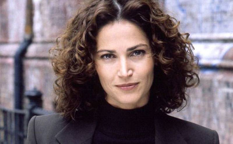 A promotional portrait of Kim Delaney for NYPD Blue.