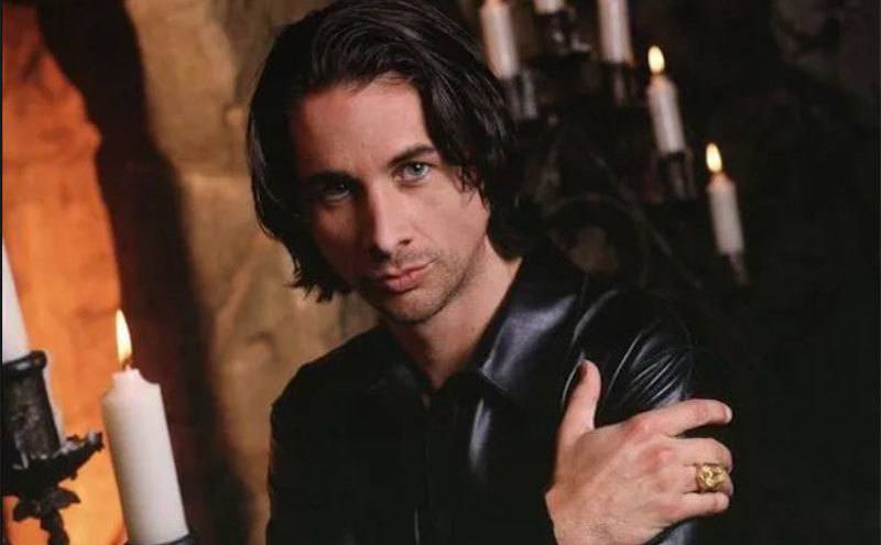 A still of Father Michael Morley revealing his vampiric identity.