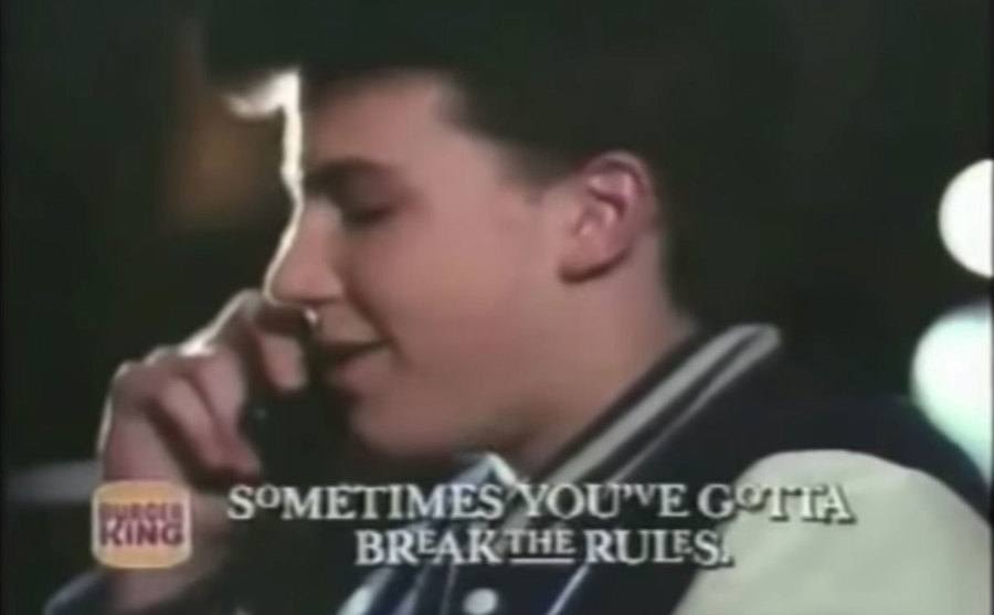 Ben Affleck talks on the phone for a Burger King commercial.