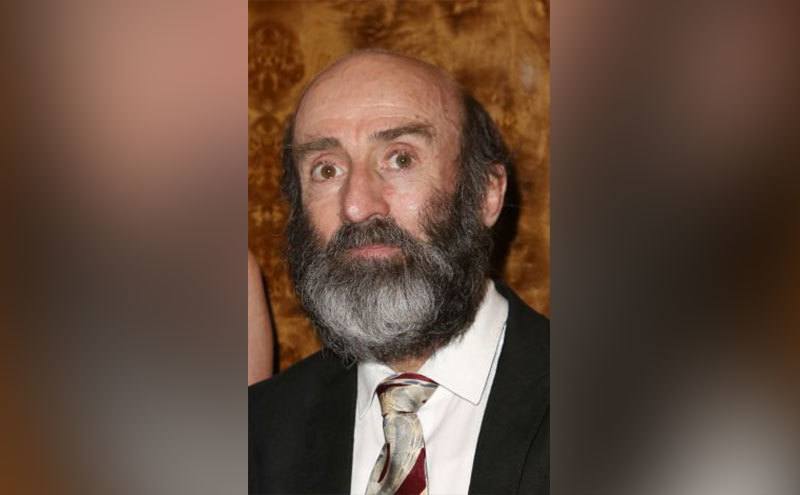 A portrait of Patrick Kerr.