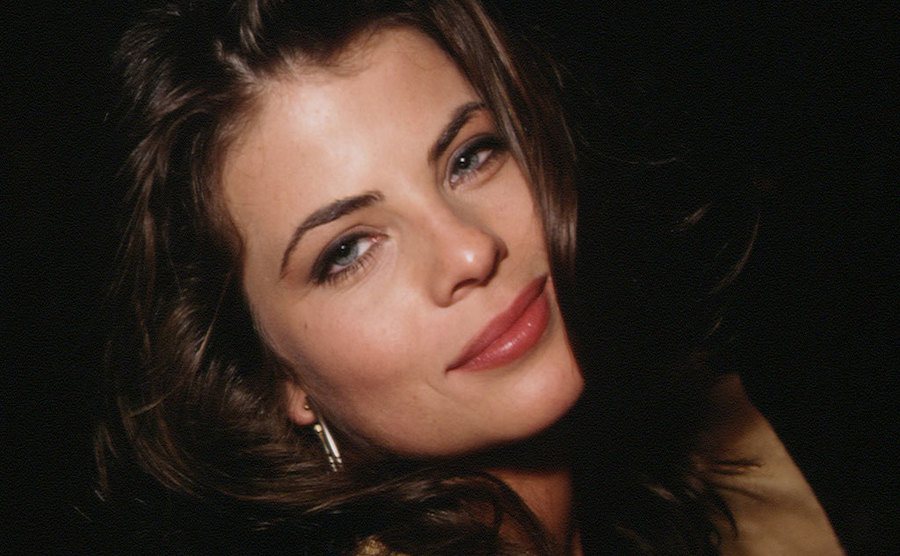 A dated portrait of Yasmine Bleeth.