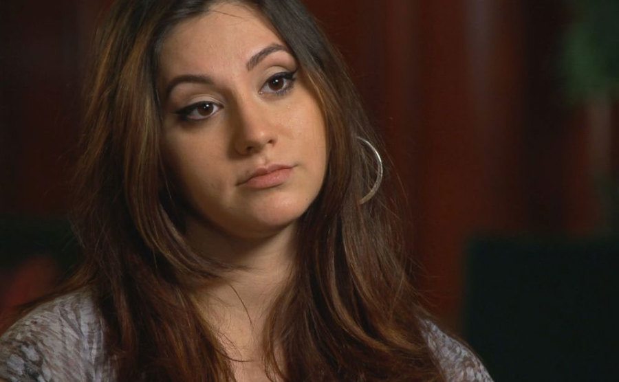 A still of Abigail during an interview.