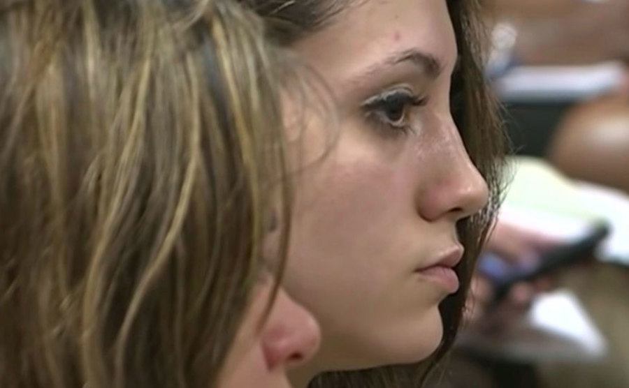 A photo of Abby sitting in the courtroom during Kibby’s trial.