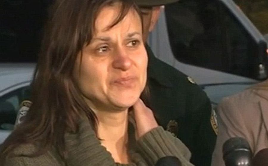 Zenya cries while addressing the media in a press conference.