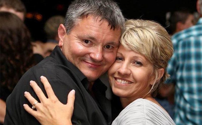 A picture of Todd and Barbara embracing each other.
