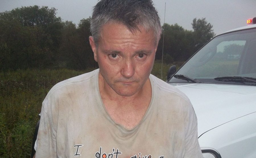 A photo of Todd by the side of the road.