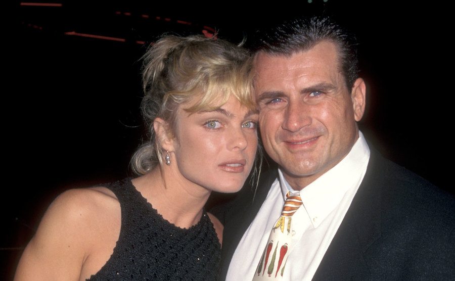 Erika Eleniak and Philip Goglia attend an event.