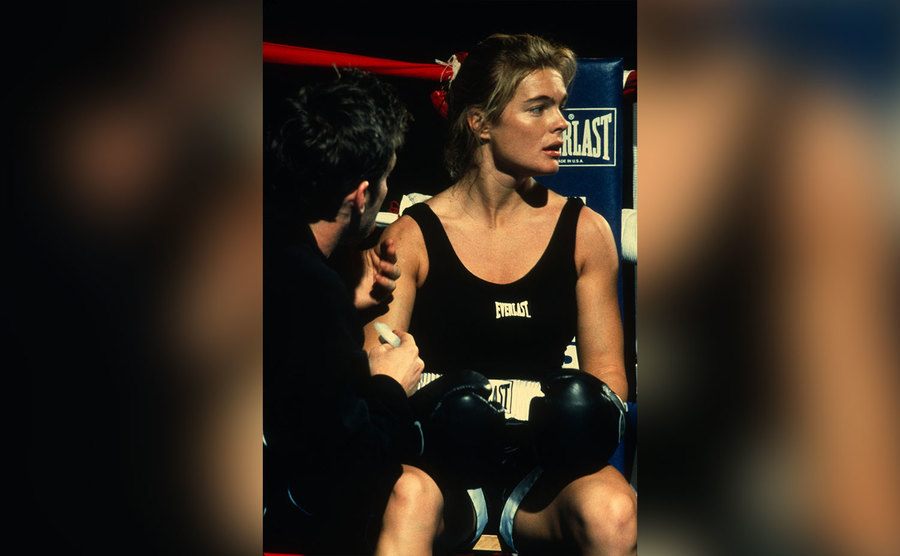 Erika Eleniak sits in the ring as Patty Sullivan.