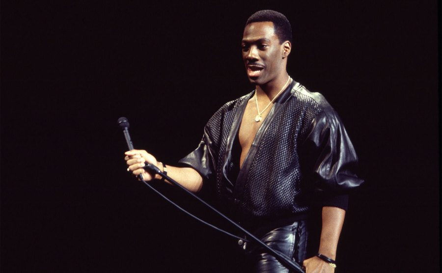 Eddie Murphy performs onstage at Madison Square Garden during his 'Raw Tour'.