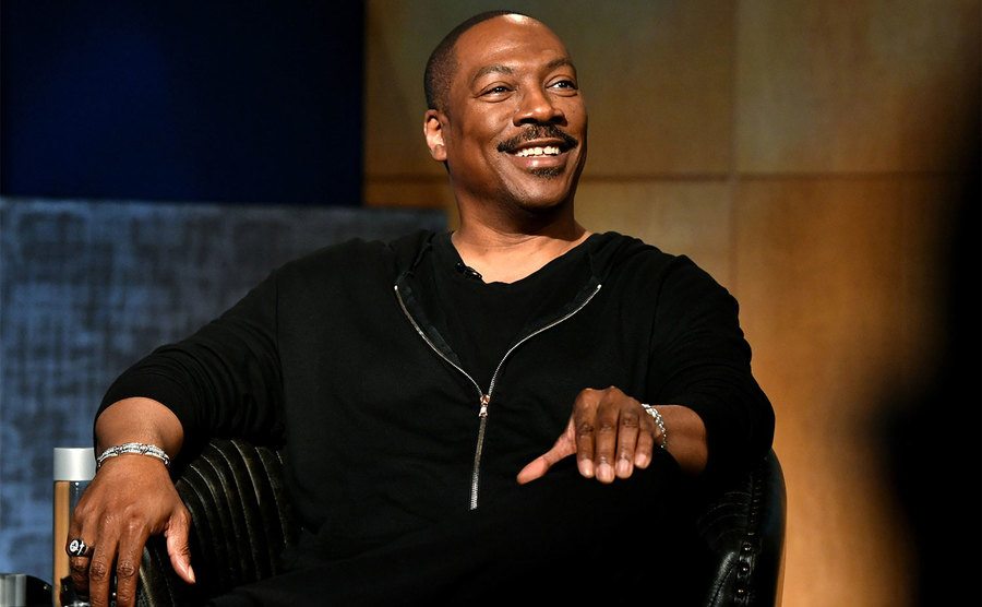 Eddie Murphy speaks onstage. 