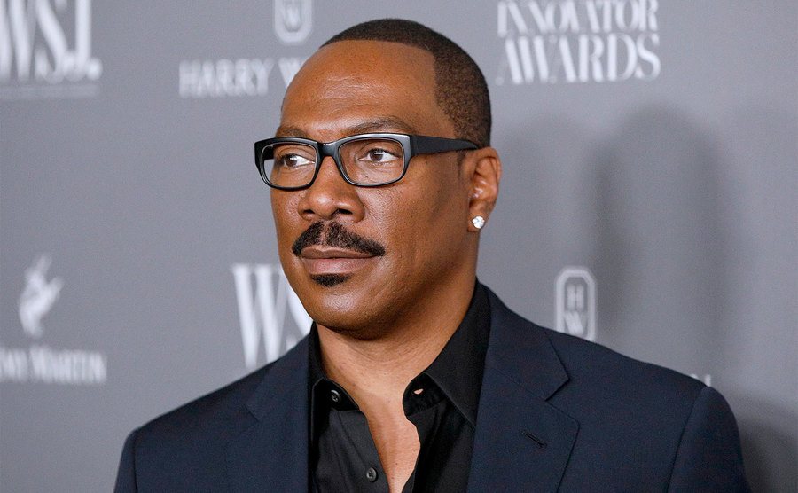 Eddie Murphy arrives at an event. 