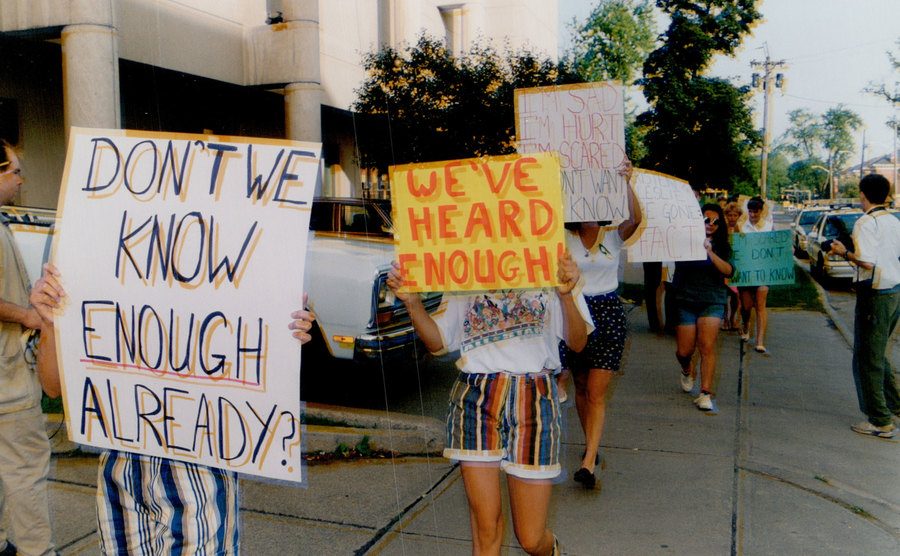 Protesters gather outside the courthouse to manifest against Paul and Karla.