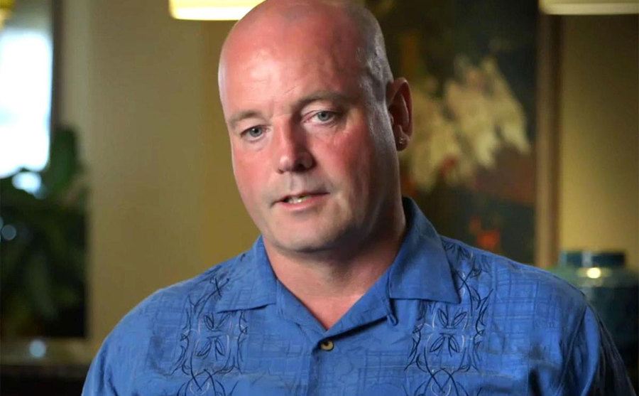 John speaks during an interview.