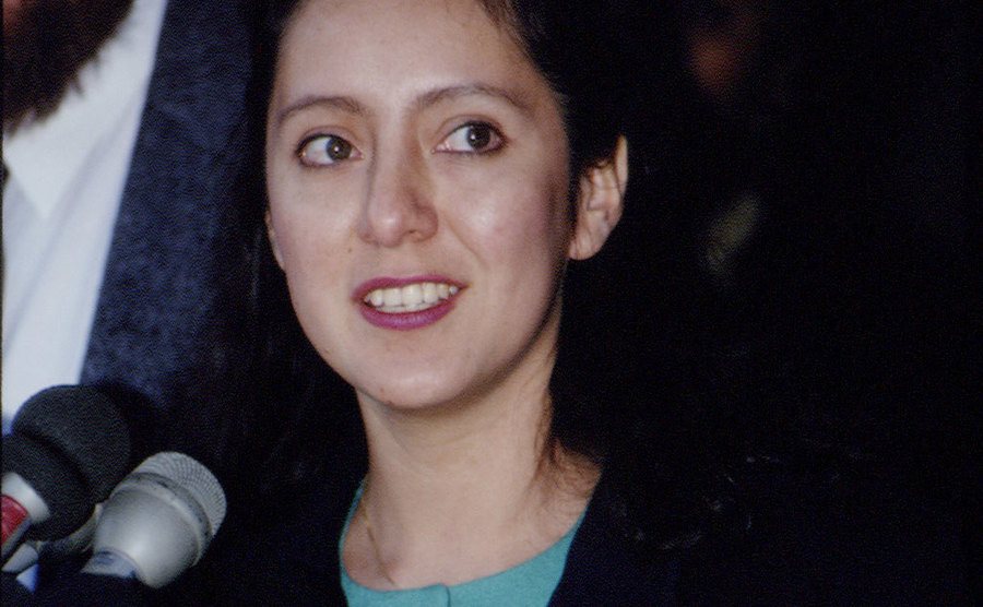 A dated image of Lorena addressing the press.