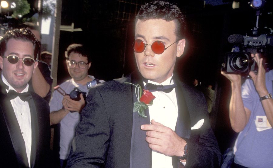 An image of John arriving at an event.