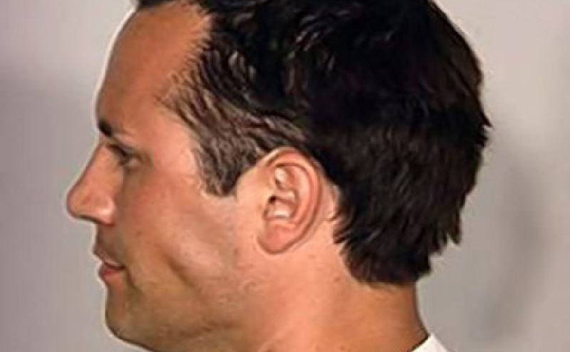 A mugshot of Jenkins.