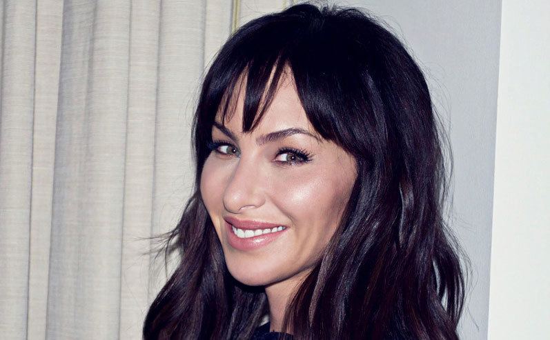 Molly Bloom smiles to the camera.
