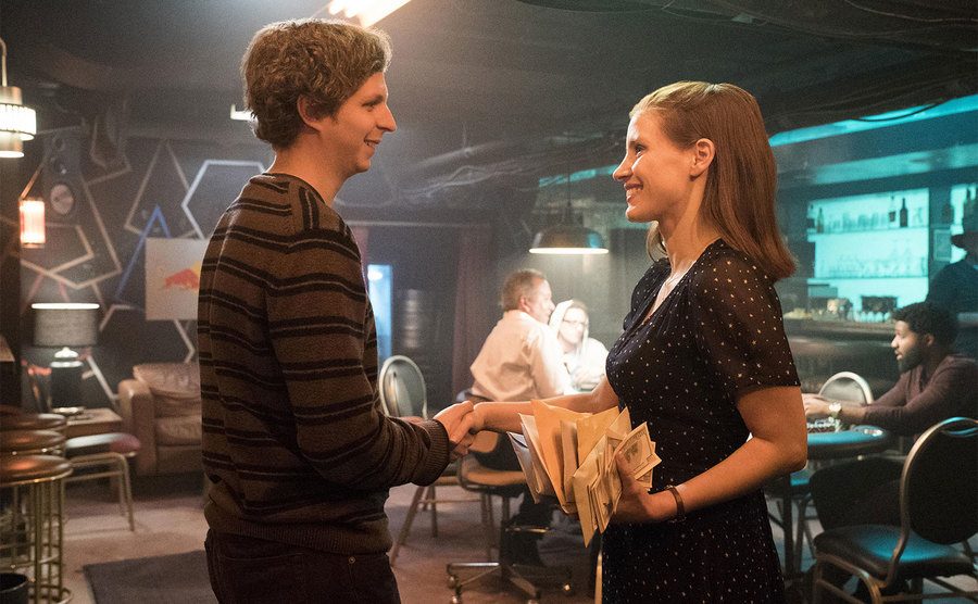 Chastain and Cera in a still from Molly’s Game.