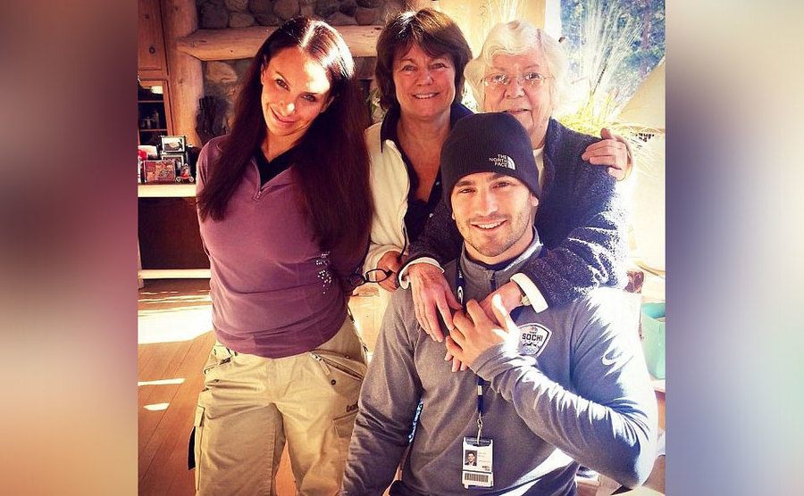 olly poses with her family.