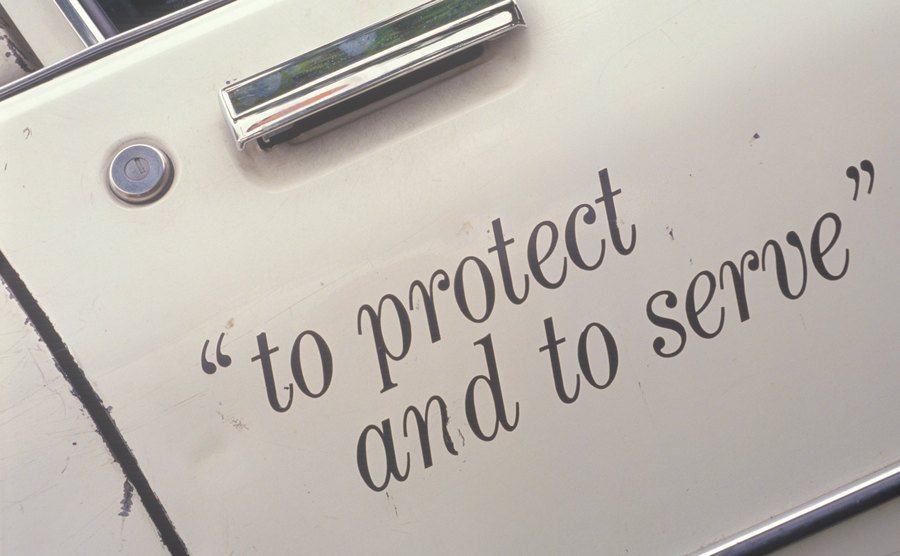 A photo of a text on the door of an LA police car.