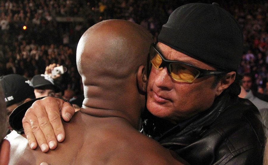 Steven Segal wishes Anderson Silva good luck before his fight.