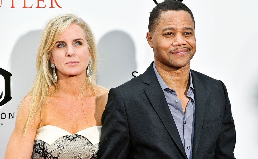 A photo of Sara Kapfer and Gooding Jr. attending an event.