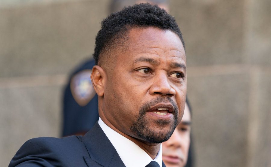 Gooding Jr. addresses the media.