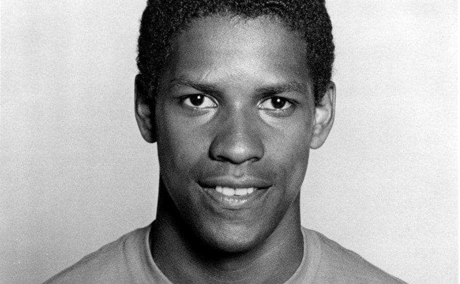 A studio portrait of a young Denzel Washington.