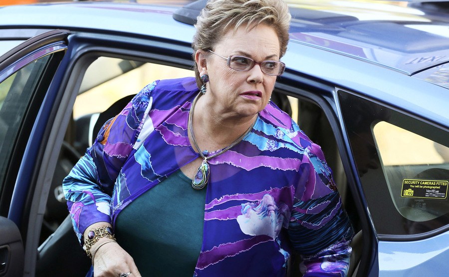 An image of Lindy getting out of her car.