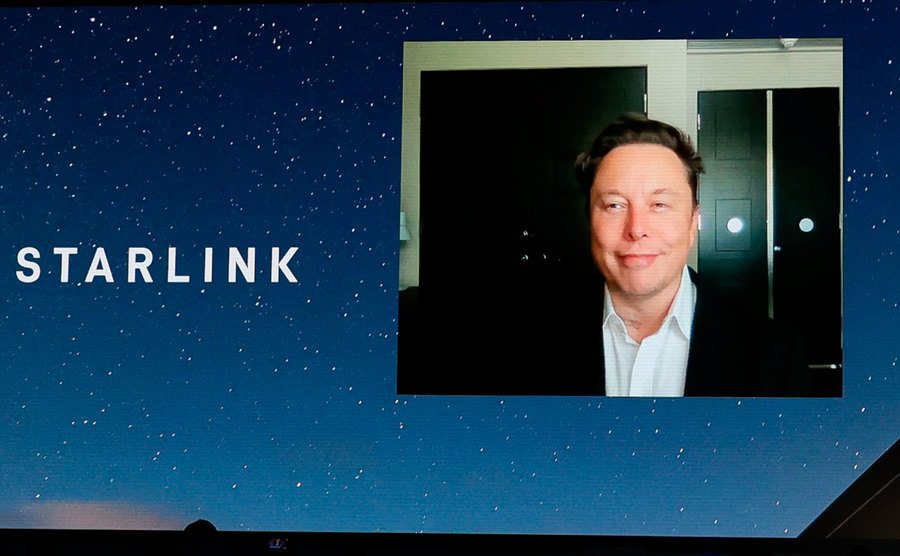 An image of Elon Musk during a conference.