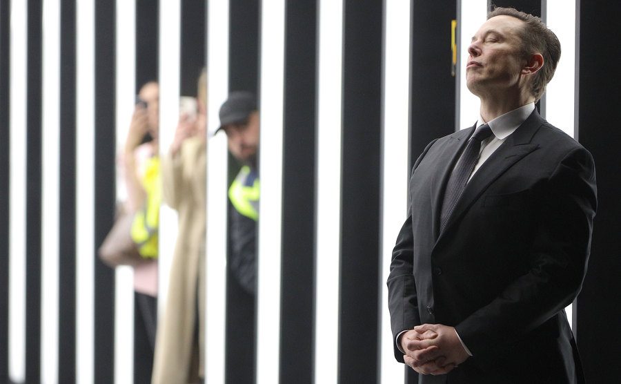 A photo of Elon Musk during a Tesla event.