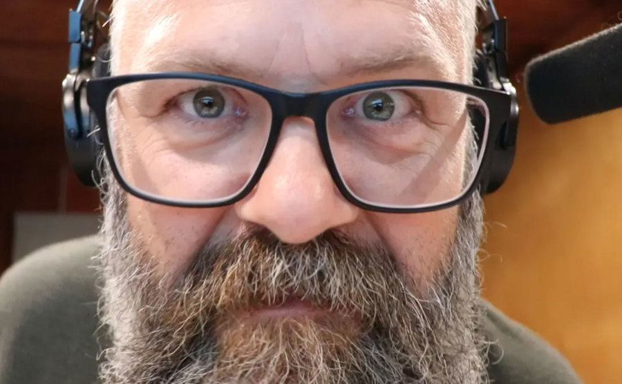 A photo of David Pettitt at a recording studio.