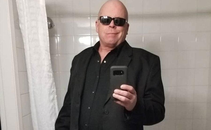 An image of Ken Monkhouse taking a picture of himself in front of a mirror.