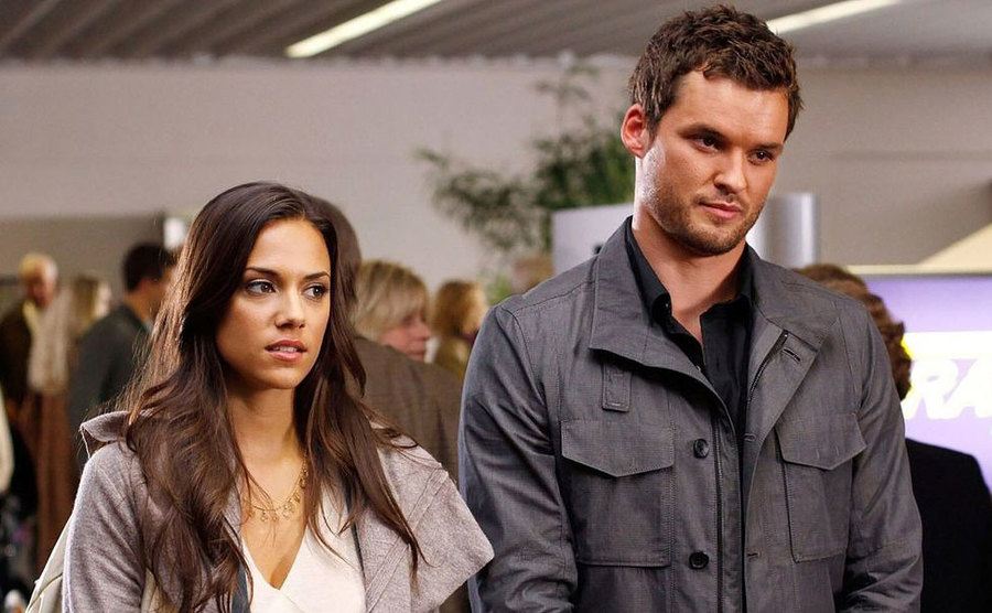 Jana Kramer and Austin Nichols in a still from One Tree Hill.