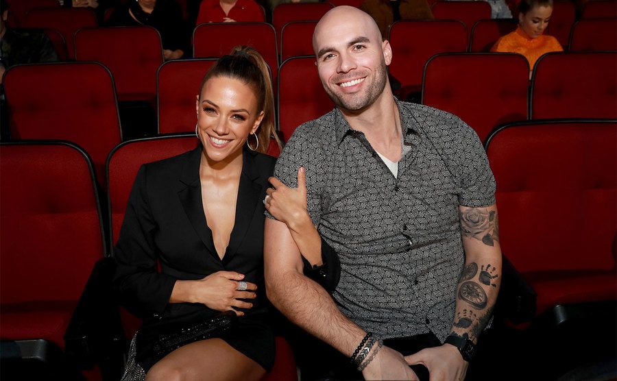 Jana Kramer and Mike Caussin attend the 2019 iHeartRadio Music Awards.