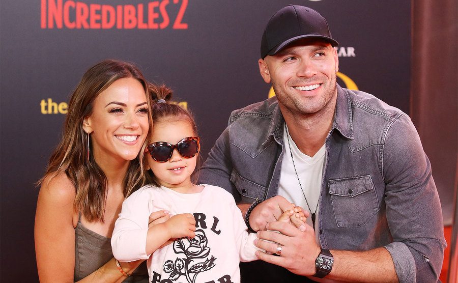 ana Kramer, Mike Caussin, and their daughter, Jolie Rae Caussin attend the Premiere of the