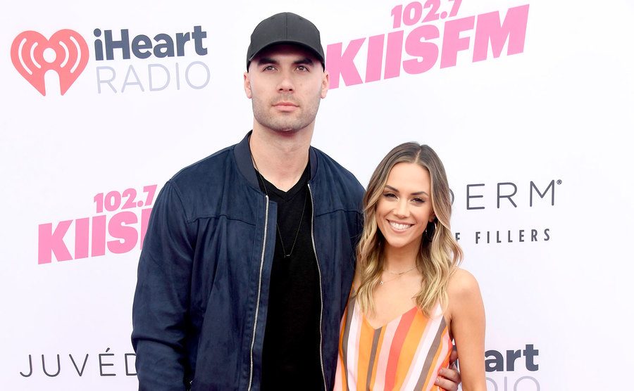 Mike Caussin and Jana Kramer attend an event.