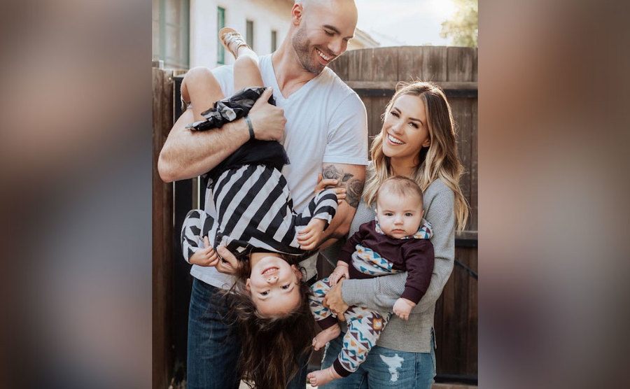 Mike and Jana pose with their children.