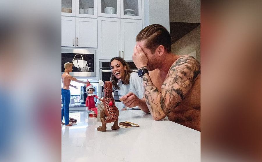 Jana and Ian are playing with kids’ toys at home.