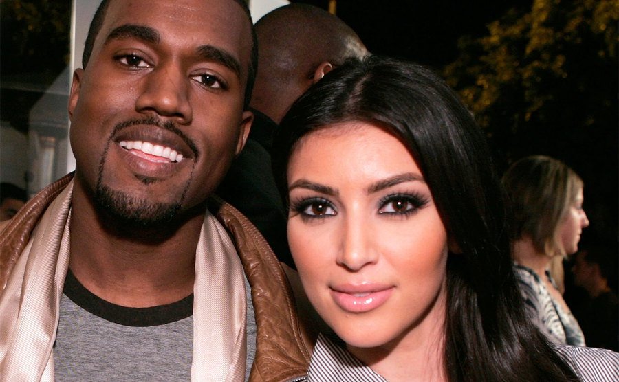 Kanye West and Kim Kardashian attend the grand opening of Intermix.