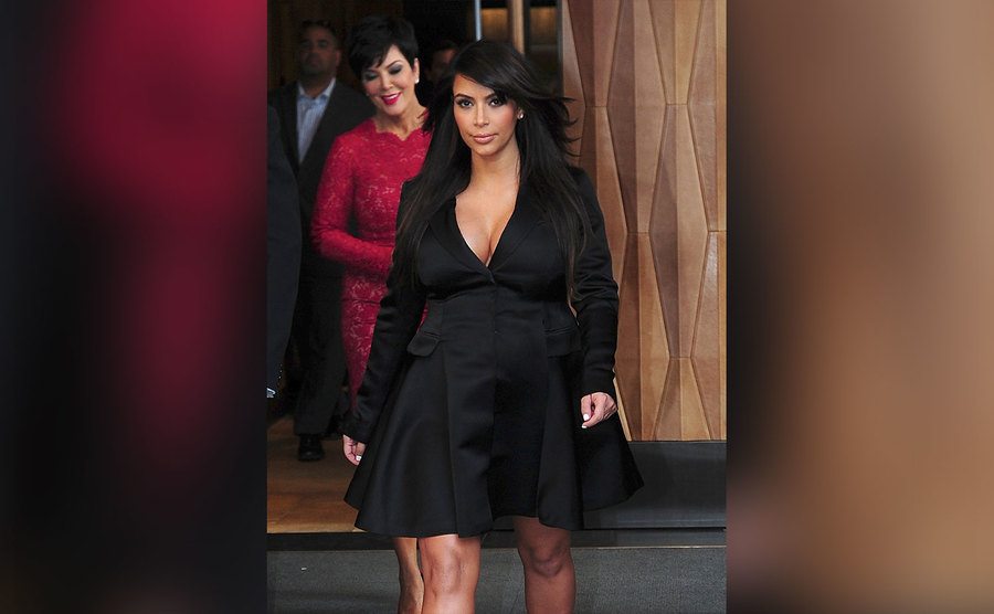A pregnant Kim Kardashian leaves her hotel.